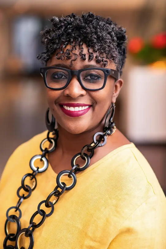 Smiling woman with curly hair