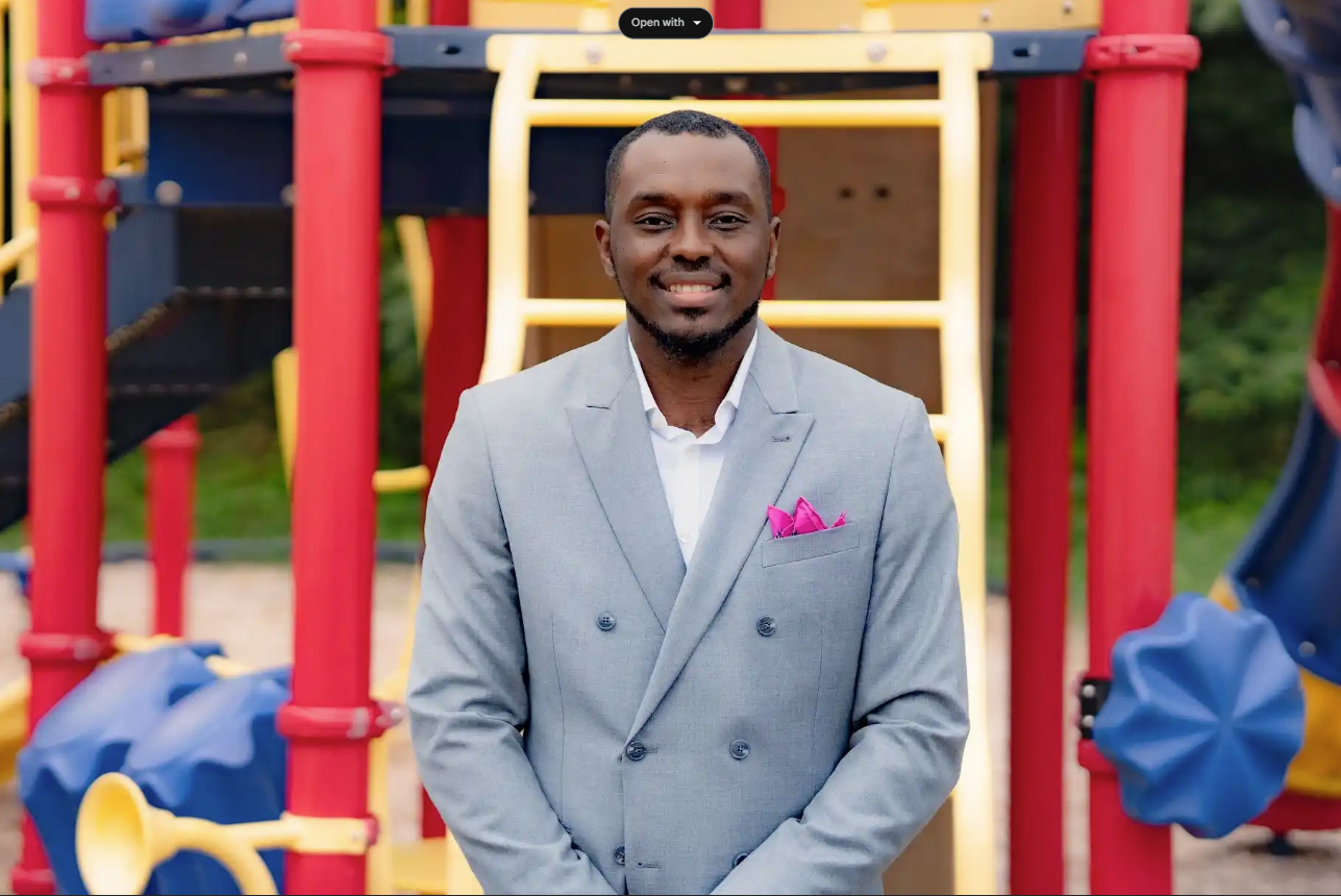 Man in suit at playground